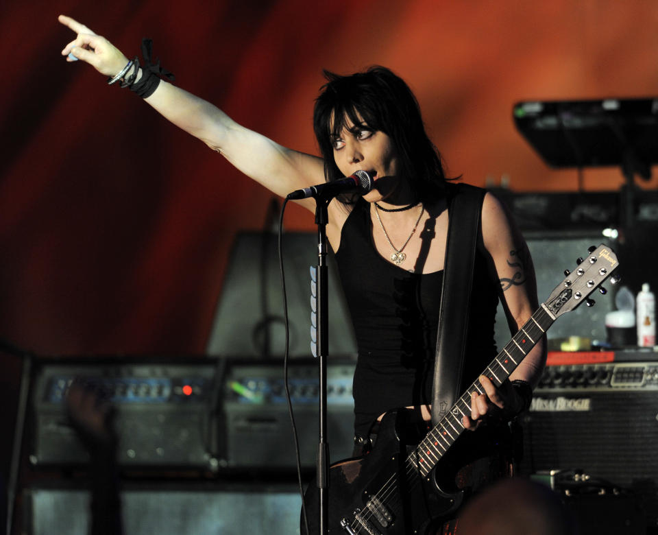 FILE - In this April 29, 2011, file photo, Joan Jett performs with The Blackhearts during the 18th Annual Race to Erase MS Gala, in Los Angeles. Jett will be honored with the Golden God Award, given to an artist who “embodies the spirit of hard rock and metal.” She’s the first female to earn the award. The Revolver Golden Gods Awards for hard rock takes place April 23 at the Club Nokia in Los Angeles. (AP Photo/Chris Pizzello, File)