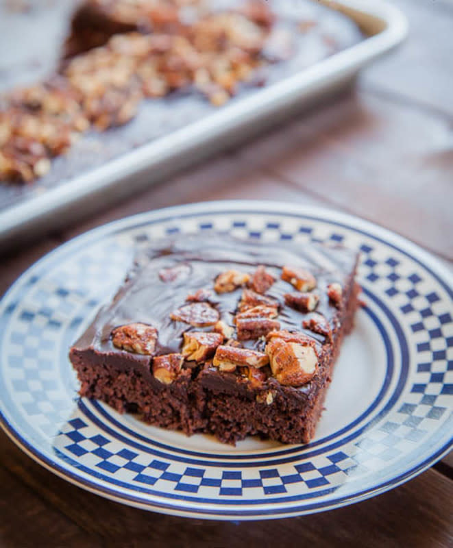 <p>Eat the Love</p><p>Chocolate spices like cinnamon, nutmeg and a touch (just a touch) of cayenne pepper take this nutty chocolate sheet cake up to an eleven. </p><p><strong>Get the recipe: </strong><a href="https://www.eatthelove.com/texas-sheet-cake/" rel="nofollow noopener" target="_blank" data-ylk="slk:Tex-Mex Sheet Cake with Sugar Spiced Pecans;elm:context_link;itc:0;sec:content-canvas" class="link rapid-noclick-resp"><strong>Tex-Mex Sheet Cake with Sugar Spiced Pecans</strong></a></p>