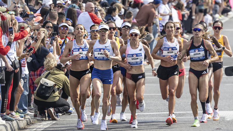 Competitors run during the U.S. Olympic Marathon Trials in Orlando, Fla., Saturday, Feb. 3, 2024. 