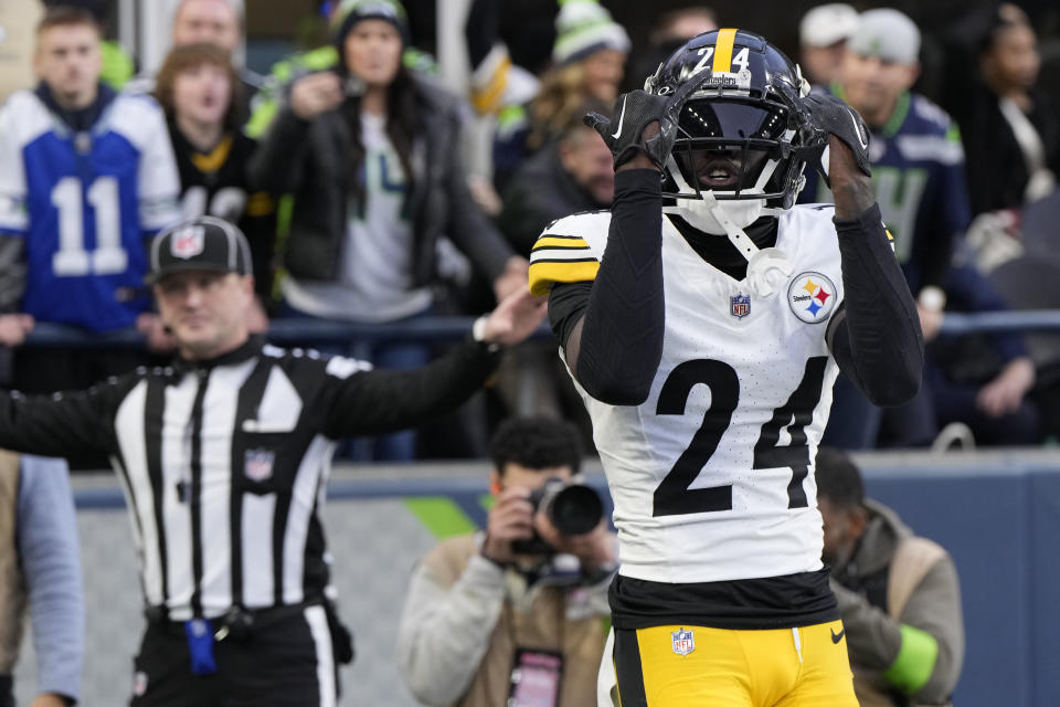 Pittsburgh Steelers cornerback Joey Porter Jr. (24) celebrates after breaking up a pass in the end zone against the Seattle Seahawks in the second half of an NFL football game Sunday, Dec. 31, 2023, in Seattle. The Steelers won 30-23. (AP Photo/Stephen Brashear)