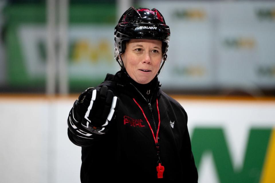Carla MacLeod, head coach of the Professional Women's Hockey League (PWHL)'s Ottawa team, speaks to players during training camp on Nov. 17, 2023.