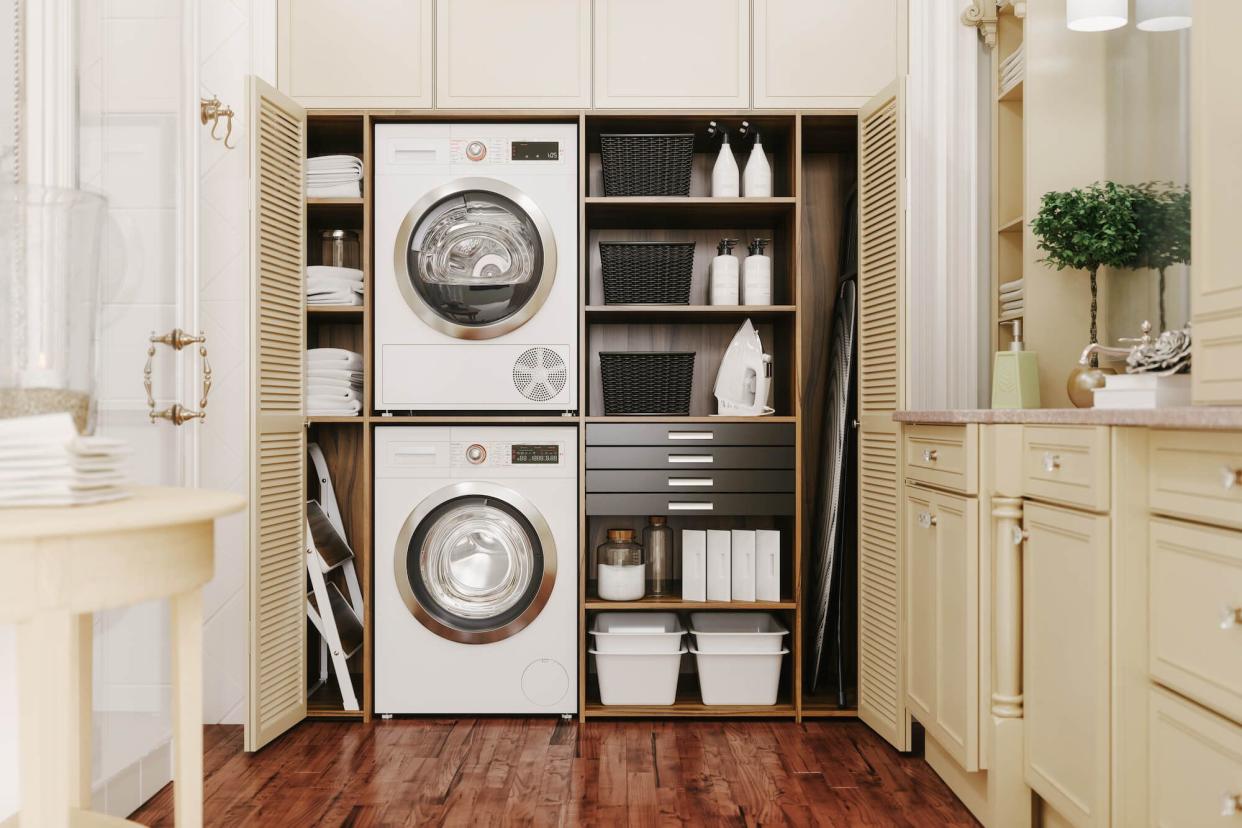 A laundry room with washer and dryer