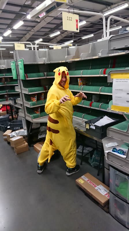 Glen Walton, a postman, wears fancy outfits at work and raises money for charity, as the spread of coronavirus disease (COVID-19) continues, in Mansfield Woodhouse