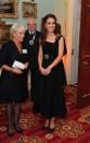 <p>Both Kate and Meghan know you can never go wrong with an LBD. Here, Kate paired hers with closed-toe shoes and a statement belt for an awards ceremony in 2016.</p>
