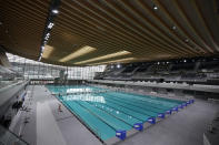 A view of the Olympic Aquatic Center, Wednesday, March 6, 2024 in Saint-Denis, outside Paris. The aquatic center will host the artistic swimming, water polo and diving events during the Paris 2024 Olympic Games. (AP Photo/Christophe Ena, File)