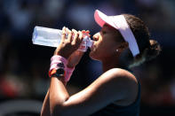 Tennis - Australian Open - Fourth Round - Melbourne Park, Melbourne, Australia, January 21, 2019. Japan's Naomi Osaka drinks water during her match against Latvia's Anastasija Sevastova. REUTERS/Lucy Nicholson