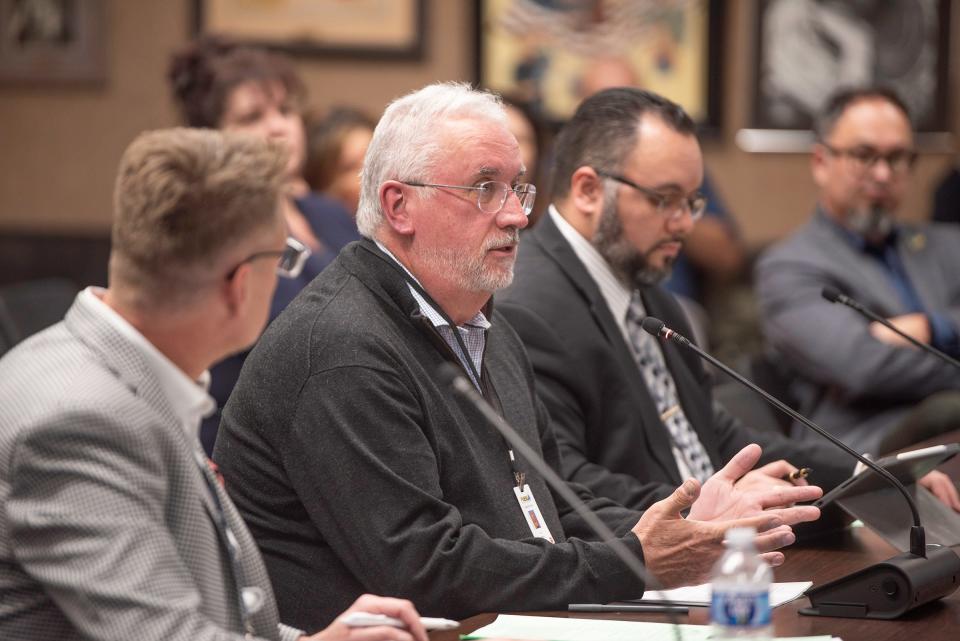 Pueblo School District 60 charter school liason Tom Weston, center, speaks during a school board meeting on Tuesday, January 30, 2024.