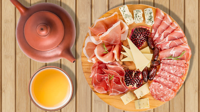 charcuterie board with tea