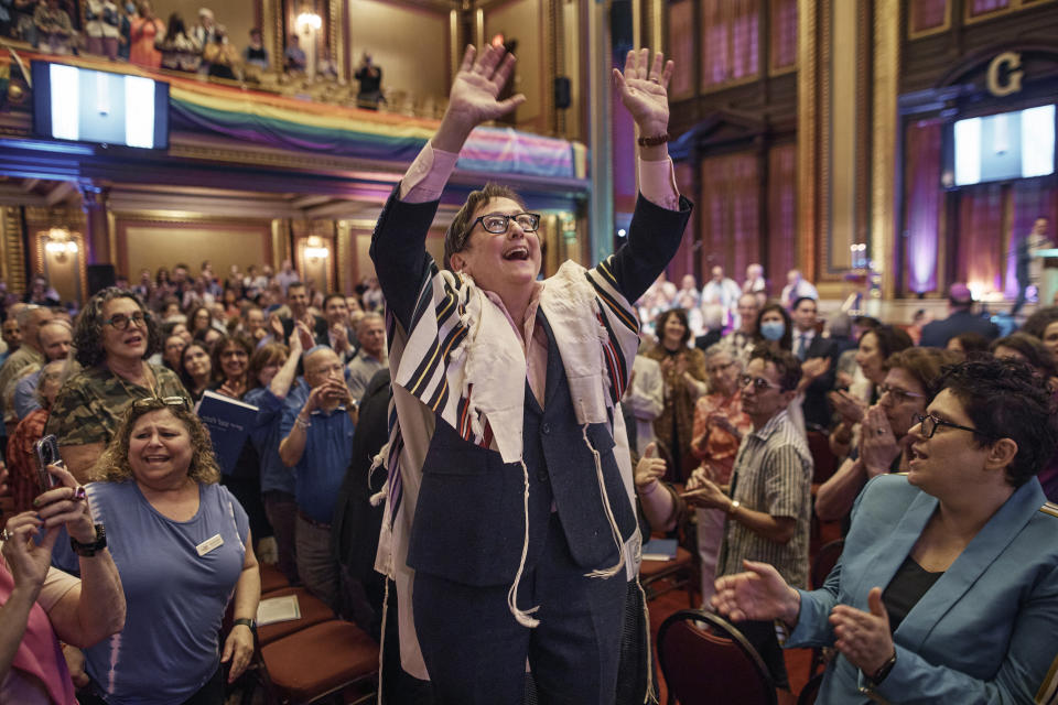 Rabbi Sharon Kleinbaum sings during her last service at the Masonic Hall, Friday, June 28, 2024, in New York. After leading the nation’s largest LGBTQ+ synagogue through the myriad ups and downs of the modern gay-rights movement for the last three decades, she is now stepping down from that role and shifting into retirement. The synagogue that she led for 32 years — Congregation Beit Simchat Torah in midtown Manhattan — will have to grapple with its identity after being defined by its celebrity rabbi for so long. (AP Photo/Andres Kudacki)