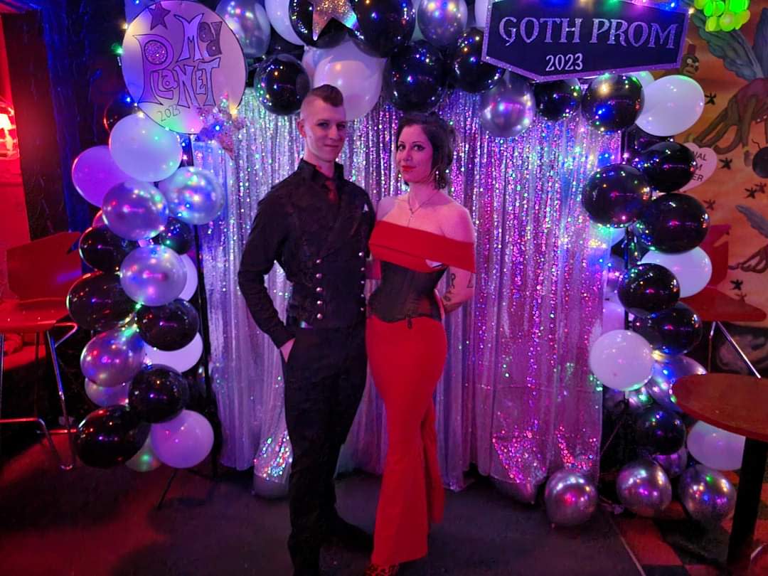 Jake Steffes, left, and Golgotha Salazar pose after being crowned the King and Queen of the 2023 Goth Prom event at Mad Planet.