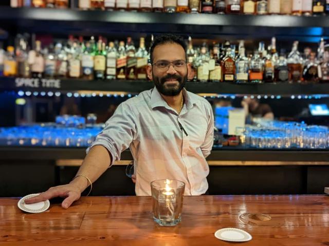 Inspired by whiskey bars and speakeasies around the world, Artemis Whiskey Bar owner Vaibhav Patel decided to open one himself in Victoria, B.C. (Rohit Joseph/CBC - image credit)
