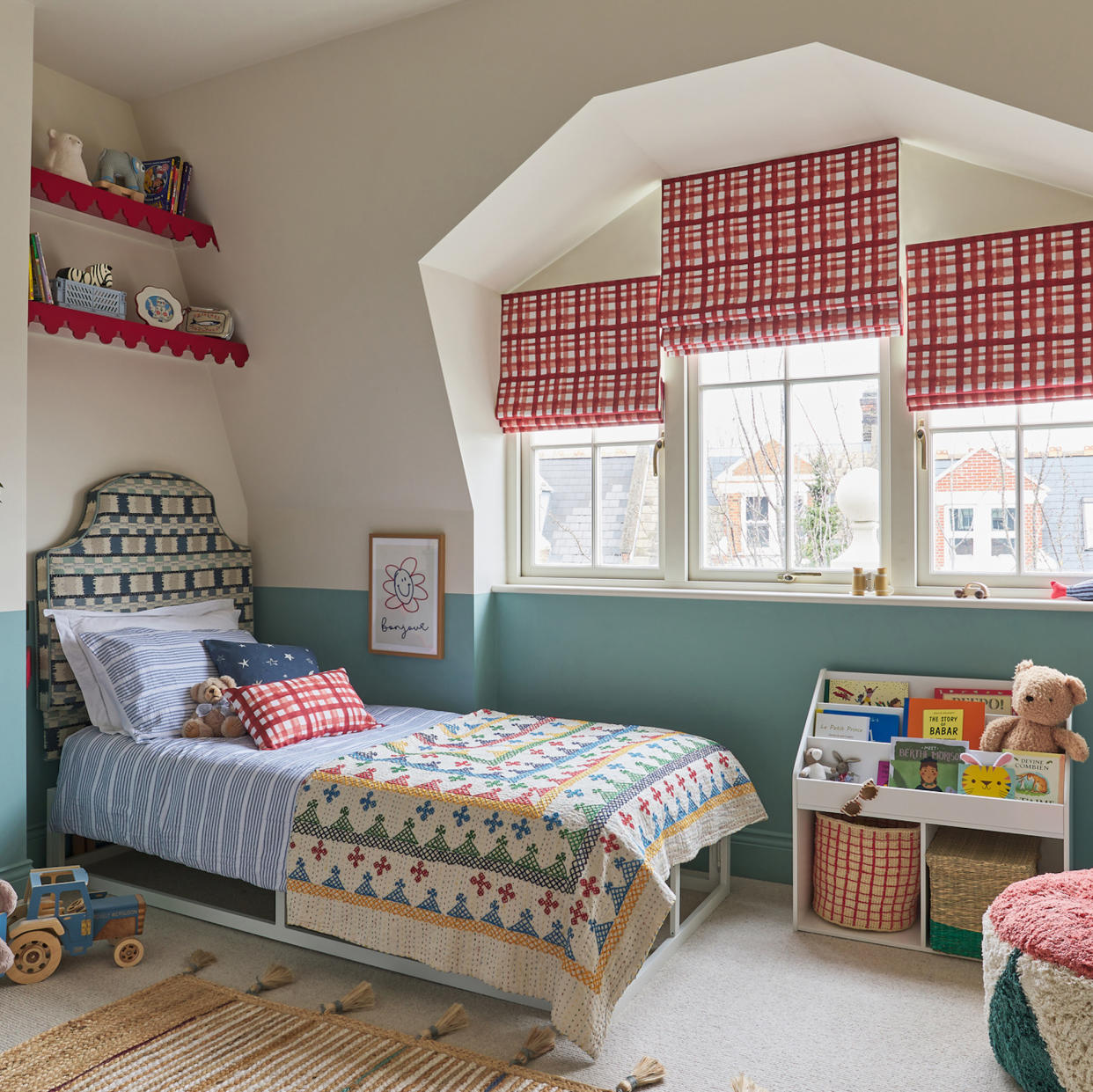  Childrens bedroom with red check blinds. 