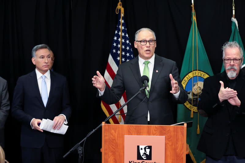 Regional leaders announce measures to combat the spread of novel coronavirus during a news conference in Seattle