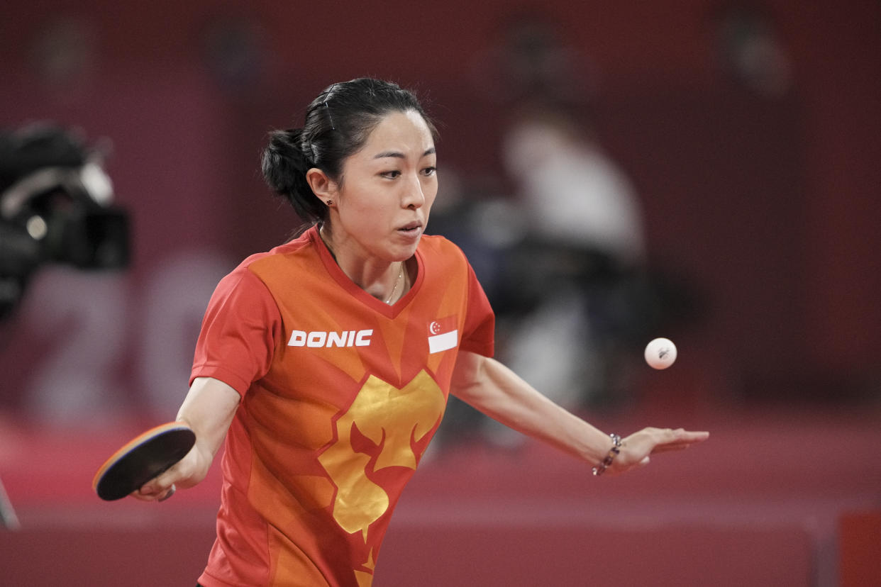 Singapore paddler Yu Mengyu in action against Portugal's Shao Jieni in her opening women's singles match at the Tokyo Olympics. (PHOTO: SNOC/Kong Chong Yew)