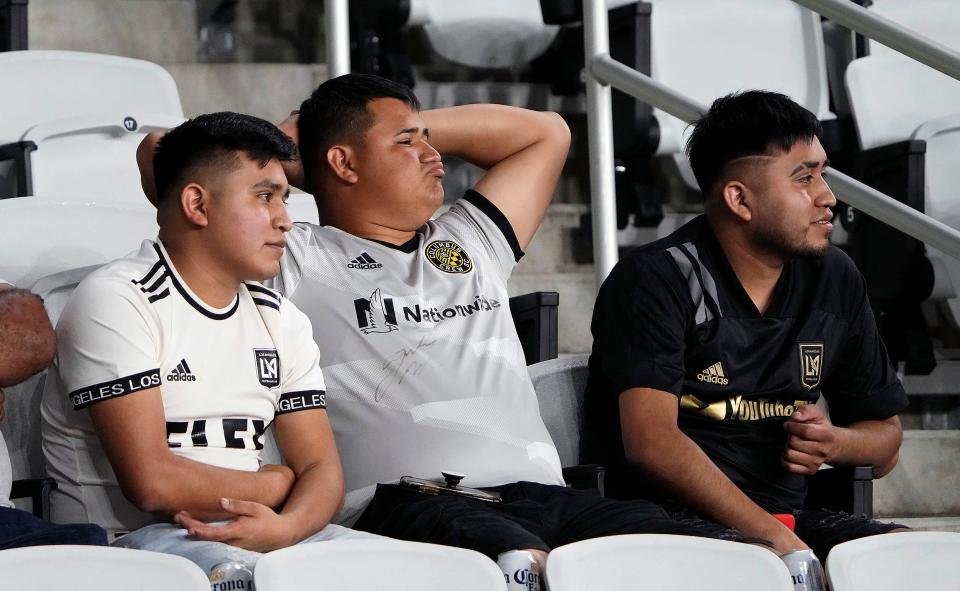 May 21, 2022; Columbus, Ohio, USA; A Columbus Crew fans watches the final second of the game between two Los Angeles FC fans during the MLS game between the Columbus Crew and Los Angeles FC at Lower.com Field in Columbus, Ohio on May 21, 2022. Los Angeles FC beat Columbus Crew 2-0. 