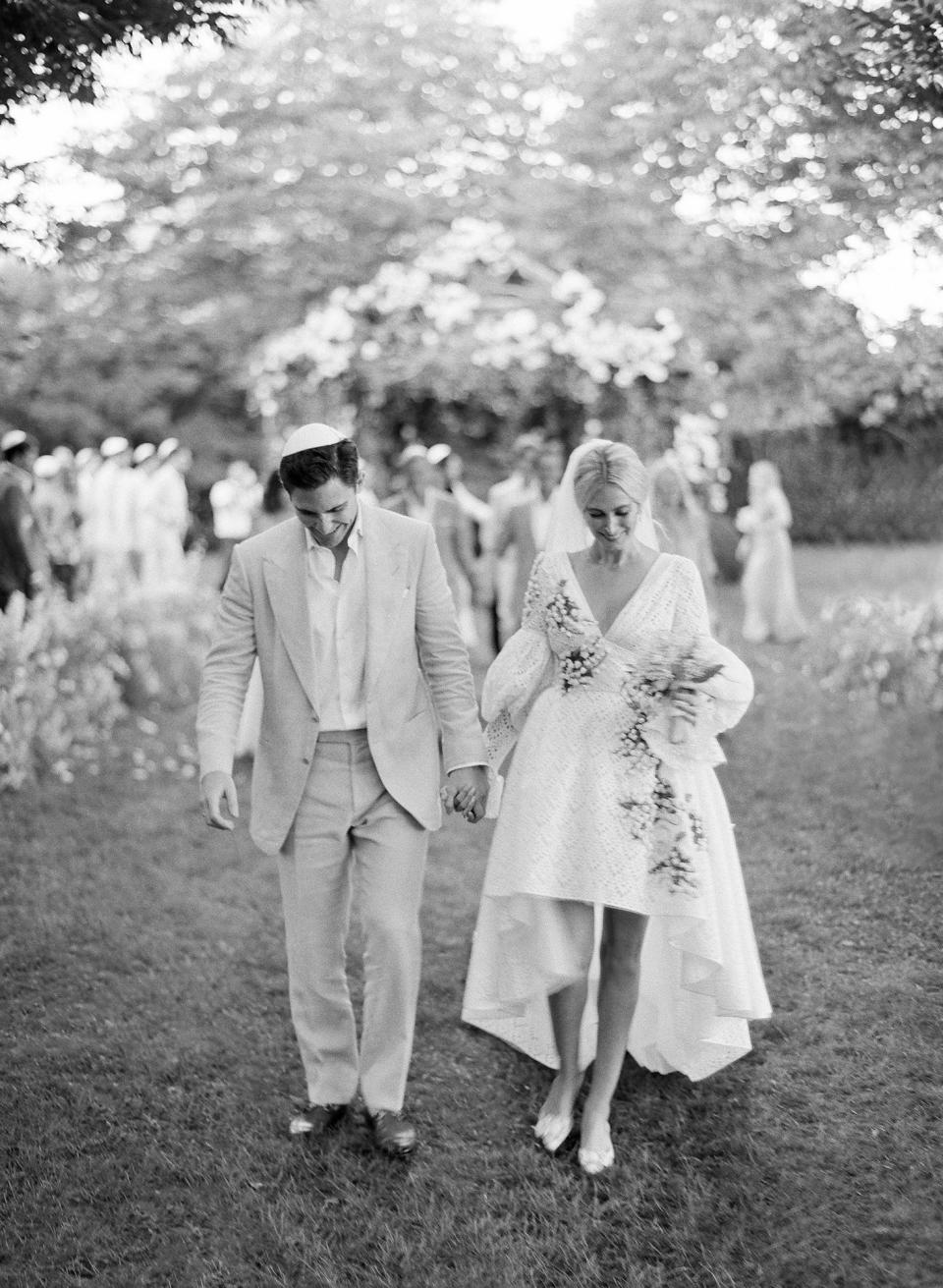 Husband and wife! Beaming with joy, we walked down the aisle as newlyweds to “Married Life.”