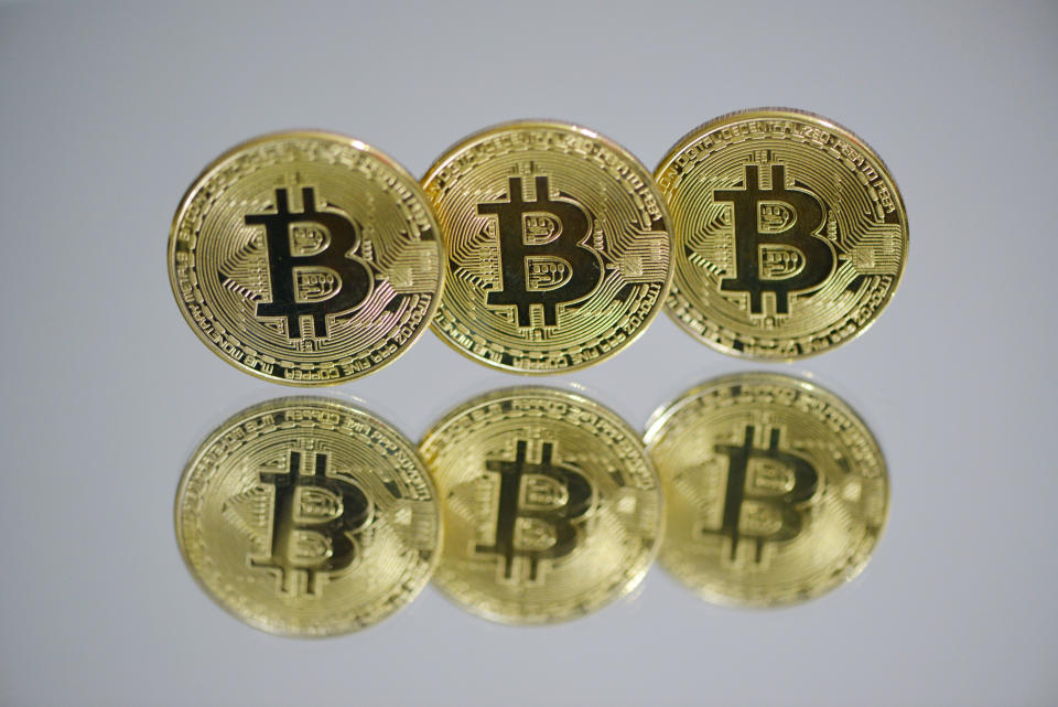 CHINA - 2021/03/13: In this photo illustration the Bitcoins are seen on display. (Photo Illustration by Sheldon Cooper /SOPA Images/LightRocket via Getty Images)