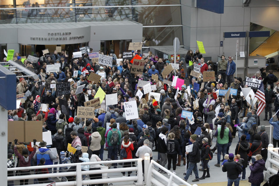 Activists gather at Portland International Airport in Oregon to protest Trump's initial travel ban on Jan. 29. (Photo: Steve Dipaola / Reuters)