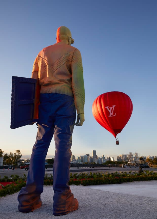 A three-story statue of Abloh erected at what would be his final runway show for Louis Vuitton, days after his death. <p>Photo: Courtesy of Louis Vuitton</p>