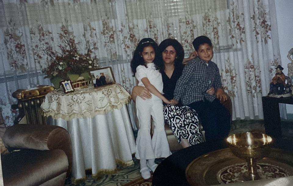 Lina Abu Akleh and her brother pictured with their aunt, Shireen Abu Akleh, as children.<span class="copyright">Courtesy of Lina Abu Akleh</span>