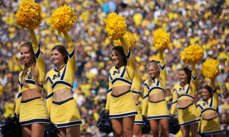 Michigan Cheerleaders performing during a game.