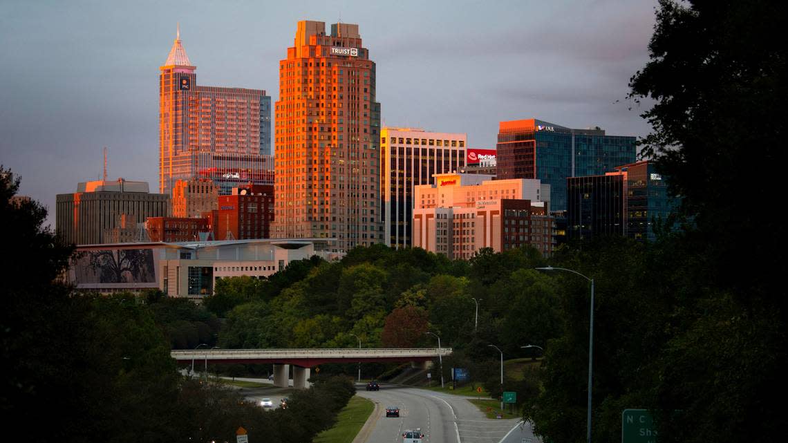 The last minutes of sunset illuminate the growing downtown Raleigh skyline, Oct. 2, 2022.