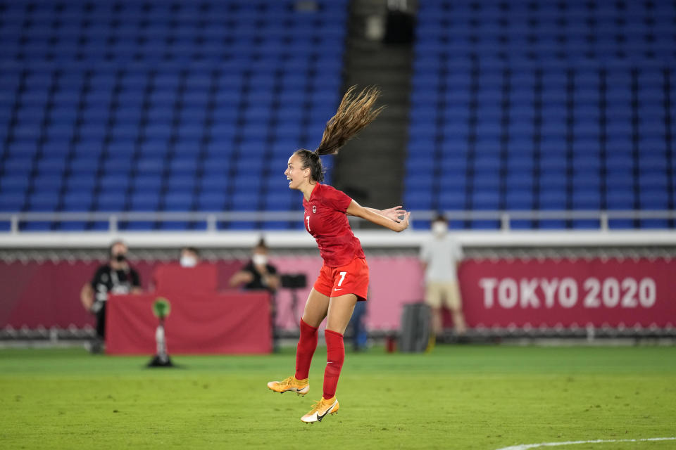 Canada's Julia Grosso celebrates after scoring the winning goal and defeating Sweden in a penalty shootout during the women's final soccer match at the 2020 Summer Olympics, Friday, Aug. 6, 2021, in Yokohama, Japan. (AP Photo/Andre Penner)