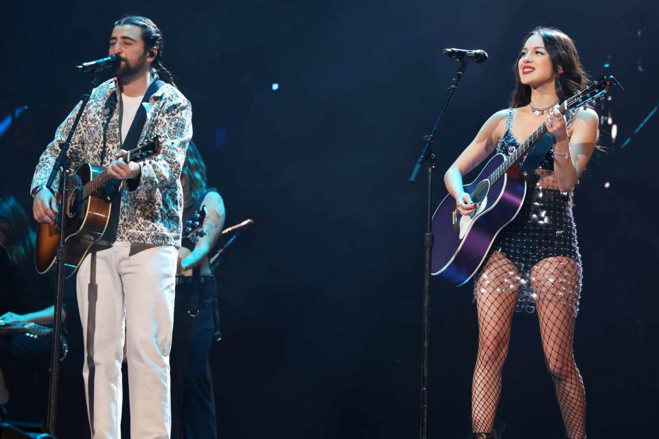 <p>Kevin Mazur/Getty Images</p> Noah Kahan and Olivia Rodrigo perform at Madison Square Garden in New York City on April 5.