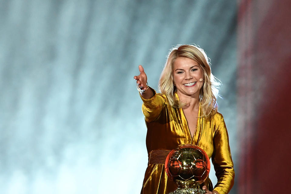 Olympique Lyonnais' Norwegian forward Ada Hegerberg gestures after receiving the 2018 FIFA Women's Ballon d'Or award for best player of the year during the 2018 FIFA Ballon d'Or award ceremony at the Grand Palais in Paris on December 3, 2018. - The winner of the 2018 Ballon d'Or will be revealed at a glittering ceremony in Paris on December 3 evening, with Croatia's Luka Modric and a host of French World Cup winners all hoping to finally end the 10-year duopoly of Cristiano Ronaldo and Lionel Messi. (Photo by FRANCK FIFE / AFP)        (Photo credit should read FRANCK FIFE/AFP/Getty Images)