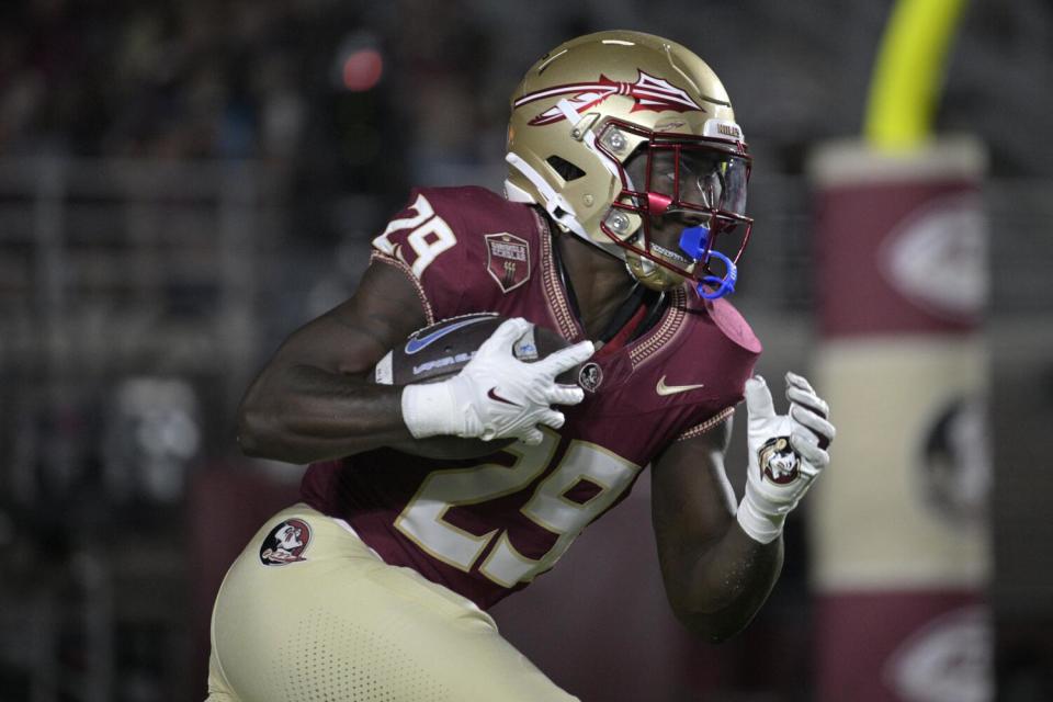 Florida State running back Rodney Hill runs a kickoff against Duke on Saturday.