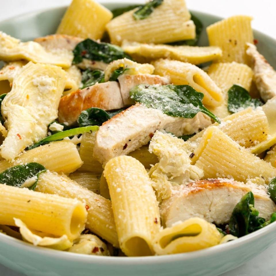 <p>Your favourite dip deconstructed as a pasta? Yes, please.</p><p>Get the <a href="https://www.delish.com/uk/cooking/recipes/a35040907/chicken-spinach-and-artichoke-rigatoni-recipe/" rel="nofollow noopener" target="_blank" data-ylk="slk:Chicken, Spinach & Artichoke Pasta;elm:context_link;itc:0;sec:content-canvas" class="link ">Chicken, Spinach & Artichoke Pasta</a> recipe.</p>