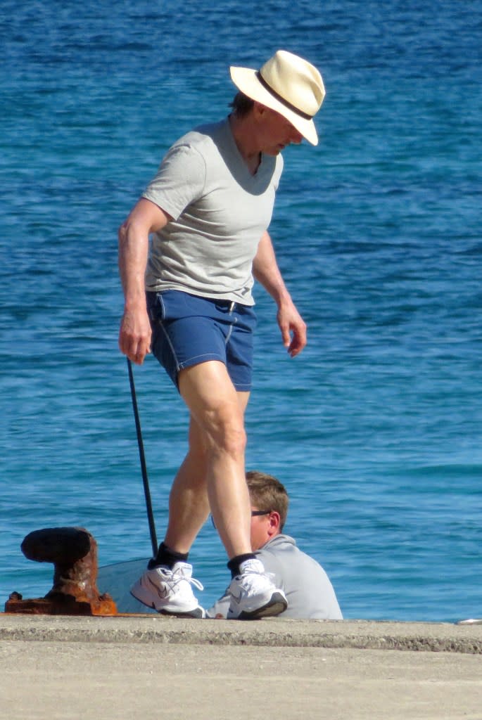 Tom Cruise goes for a walk on the beach in Majorca, Spain. Joan Llado / GTres / SplashNews.com