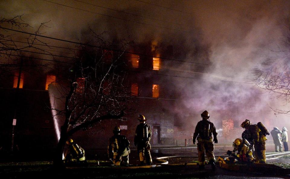 Heavy fire damages the vacant former Quin-T Corp. building at East 16th Street between Holland and French streets in January 2016.