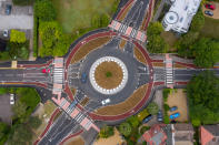 The UK's first Dutch-style roundabout � which prioritises cyclists and pedestrians over motorists � has opened in Fendon Road, Cambridge. The cost of the scheme, originally estimated at around GBP 800,000, has almost trebled to GBP 2.3m at the end of the project.