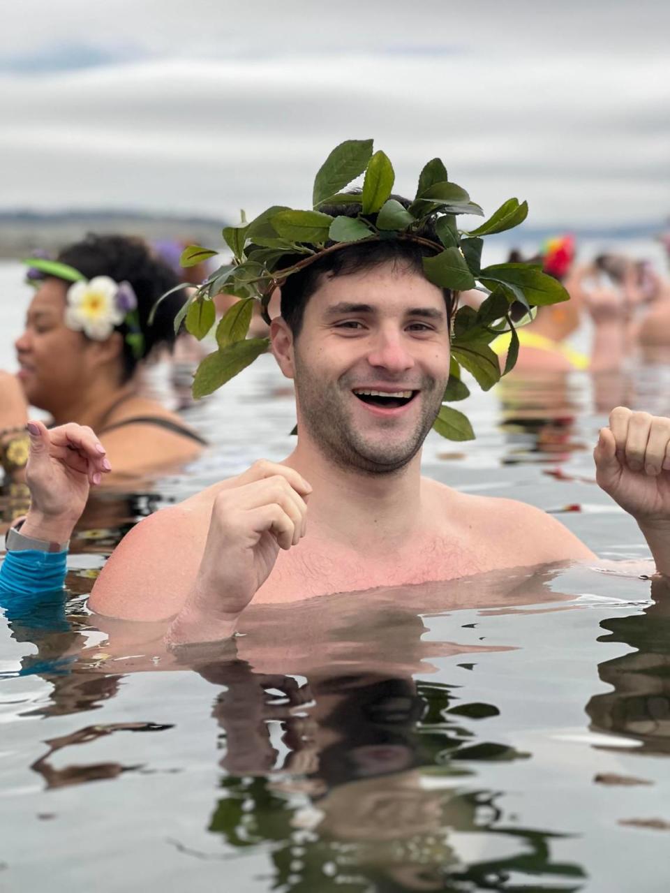 Reporter Jared Gendron stands in the Puget Sound waters on April 30, 2023, at Sunnyside Beach in Steilacoom. Plungers are advised to keep their hands out of the water. The water temperature at the time was around 49 degrees Fahrenheit.