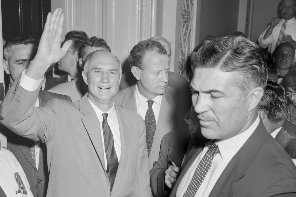  In this Aug. 29, 1957, file photo, Sen. Strom Thurmond, R-S.C., waves as he leaves the Senate chamber at end of his 24 hour, 18 minute filibuster against the Civil rights Act.  / Credit: / AP