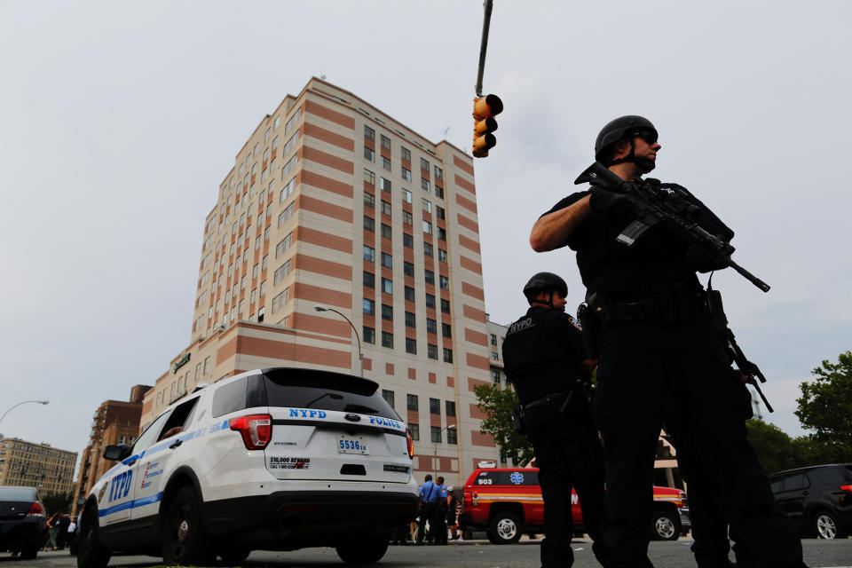 <p>NYPD officers stand guard outside the Bronx-Lebanon Hospital as they respond to an active shooter north of Manhattan in New York on June 30, 2017. (Eduardo Munoz Alvarez/AFP/Getty Images) </p>