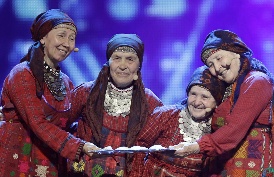 FILE - Russia Buranovskiye Babushki perform during a rehearsal for the final of the 2012 Eurovision Song Contest at the Baku Crystal Hall in Baku, Azerbaijan, May 25, 2012. The 68th Eurovision Song Contest is taking place in May in Malmö, Sweden. It will see acts from 37 countries vie for the continent’s pop crown. Founded in 1956, Eurovision is a feelgood extravaganza that strives to banish international strife and division. It’s known for songs that range from anthemic to extremely silly, often with elaborate costumes and spectacular staging. (AP Photo/Sergey Ponomarev, File)