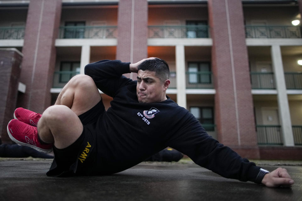 Army Staff Sgt. Daniel Murillo conducts physical training at Ft. Bragg on Wednesday, Jan. 18, 2023, in Fayetteville, N.C. Murillo’s BMI during the pandemic reached nearly 32. The North Carolina Army soldier knew he needed help, so he turned to a military dietician, who offered nutrition and exercise advice. Slowly, over months, Murillo has been able to reverse the trajectory. (AP Photo/Chris Carlson)