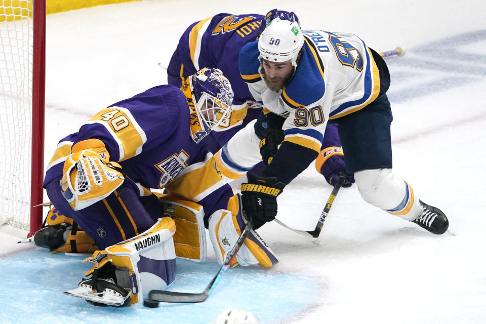 St. Louis Blues center Ryan O'Reilly, right, tries to get a shot past Los Angeles Kings goaltender Calvin Petersen during the second period of an NHL hockey game Wednesday, March 17, 2021, in Los Angeles. (AP Photo/Mark J. Terrill)
