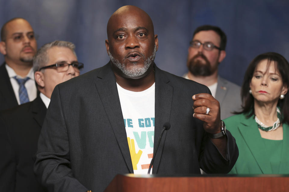 FILE - In this July 29, 2019, file photo, Desmond Meade, president of the Florida Rights Restoration Coalition, talks about Amendment 4 during a news conference at the Miami-Dade County State Attorney's Office in Miami. The effort to register Florida’s newly eligible felons to vote is being stymied by the coronavirus pandemic and a disputed requirement that felons pay a series of costs. (Sam Navarro/Miami Herald via AP, File)