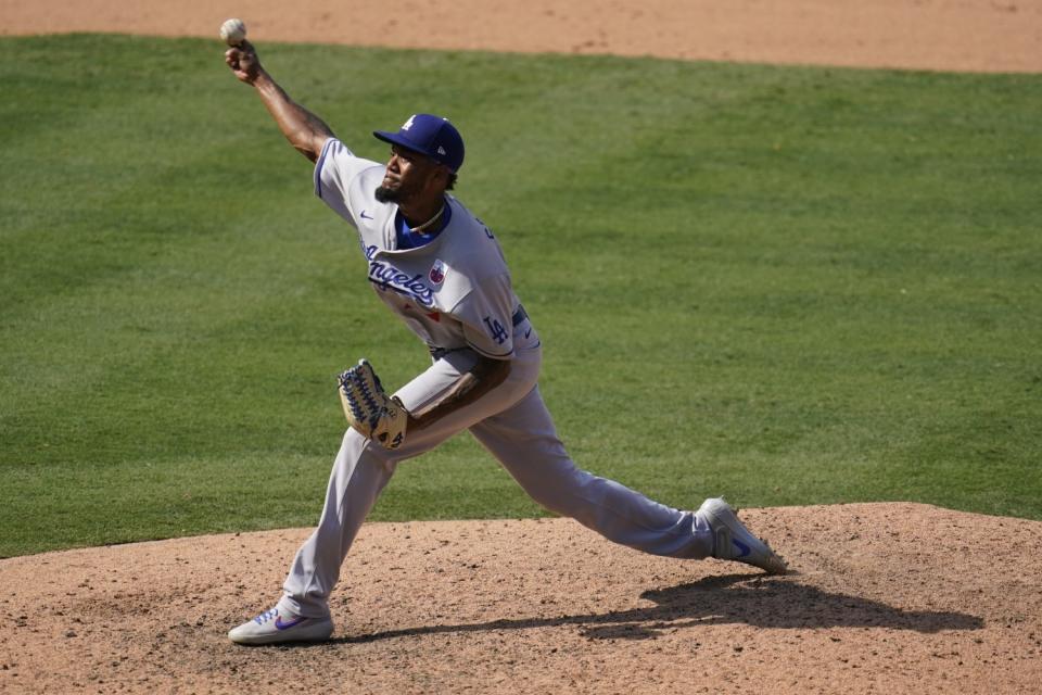 Dodgers reliever Dennis Santana throws during an 8-3 win over the Angels on Sunday.