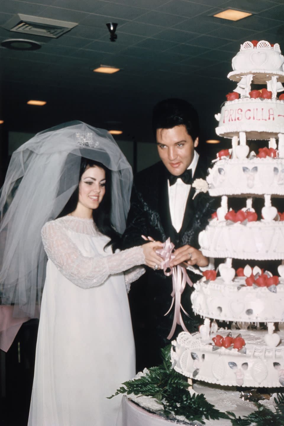 <p>Ready for a big surprise? Elvis Presley's wife Priscilla designed her own dress for the pair's Las Vegas wedding — and it was a dramatic one, featuring chiffon, beads, and a three-foot veil.</p>