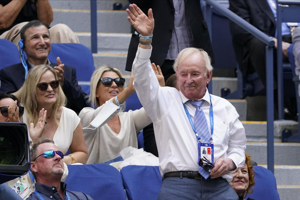 CORRECTS SPELLING TO ROD, INSTEAD OF RON - Former pro tennis player Rod Laver, right, waves to fans during the semifinals of the U.S. Open tennis tournament between Felix Auger-Aliassime, of Canada, and Daniil Medvedev, of Russia, Friday, Sept. 10, 2021, in New York. (AP Photo/Seth Wenig)