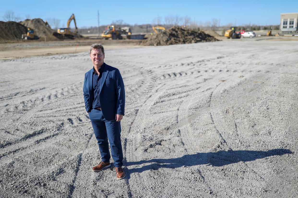 Travis Sheetz, President and CEO Sheetz, stands in the lot at Vining road and Wick road in Romulus, Mich. where they plan to build a Sheetz gas station, Thursday, Feb. 29, 2024.