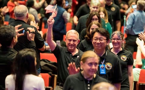 Alan Stern, with New Horizons team members  - Credit: AFP