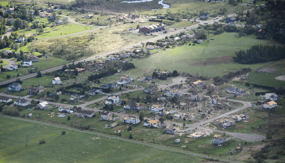 <p>Damage from a tornado is seen in Dunrobin, Ont., west of Ottawa on Saturday, Sept. 22, 2018. The storm tore roofs off of homes, overturned cars and felled power lines in the Ottawa community of Dunrobin and in Gatineau, Que. (Photo from Sean Kilpatrick/The Canadian Press) </p>