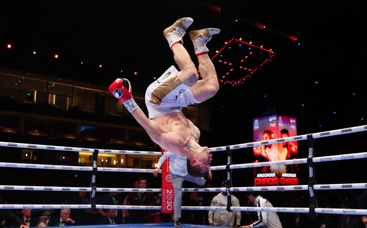 Israil Madrimov celebrates victory over Magomed Kurbanov (not pictured) with a backflip during the WBA World Super Welterweight title fight between Israil Madrimov and Magomed Kurbanov on the Knockout Chaos boxing card at the Kingdom Arena on March 08, 2024 in Riyadh, Saudi Arabia