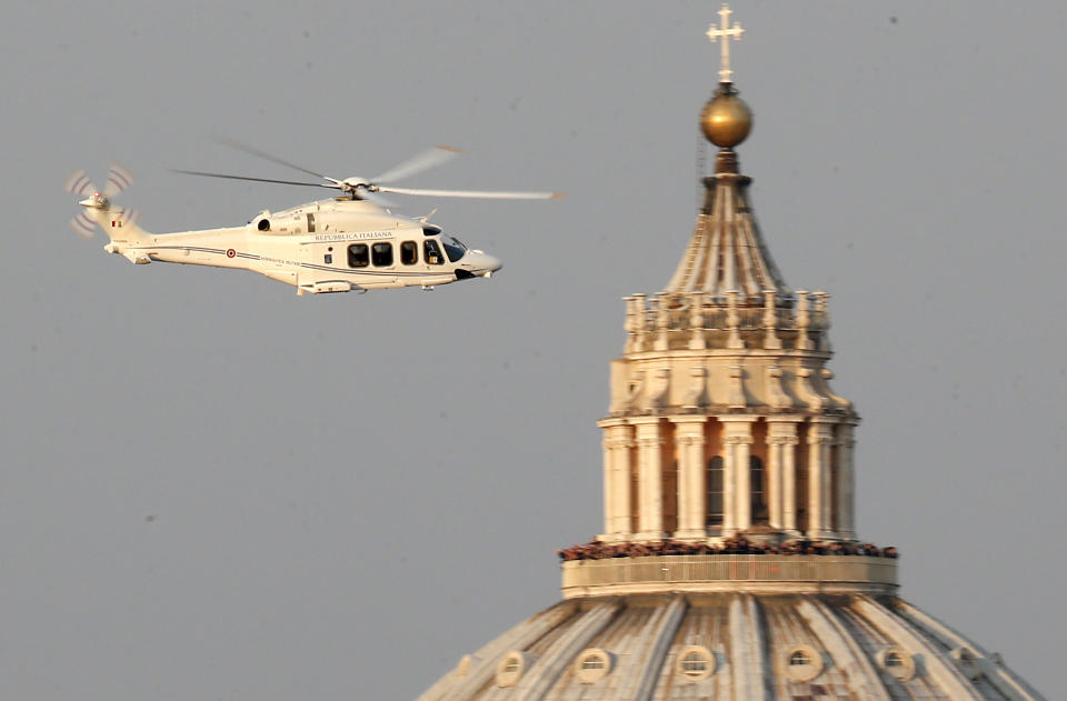 FILE - A helicopter with Pope Benedict XVI onboard leaves the Vatican bound for Castel Gandolfo on Feb. 28, 2013. Pope Emeritus Benedict XVI, the German theologian who will be remembered as the first pope in 600 years to resign, has died, the Vatican announced Saturday. He was 95. (AP Photo/Michael Sohn, File)