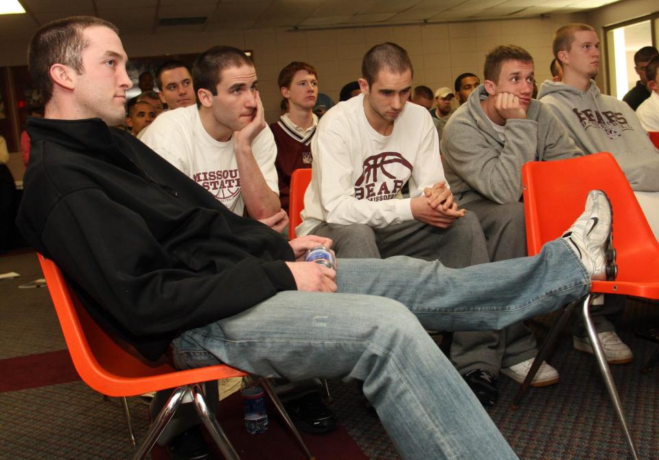 Missouri State players, Blake Ahearn, from left, Shane Laurie, Spencer Laurie, Justin Fuehrmeyer and Matt King watch as the teams selected for the postseason NCAA basketball tournament are announced, Sunday, March 11, 2007, in Springfield, Mo. Missouri State failed to make the cut as a "bubble" team for the second consecutive year.